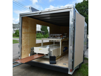 Mobile Roll Forming Machine in Enclosed Trailer Setup for Roofing Contractors